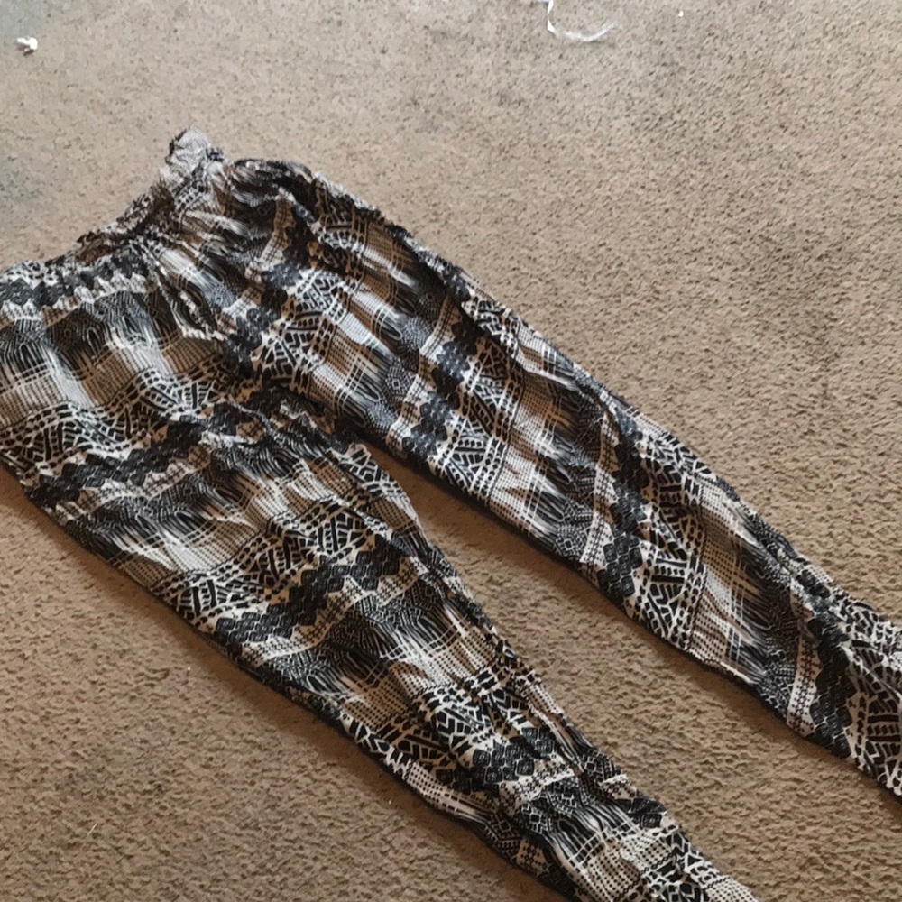 Black and cream dressy pants .